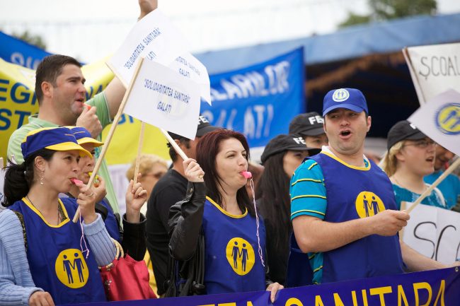 Various people are participating in a protest agains government austerity measures in Galați, Romania on June 1st, 2010.