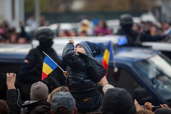 A child is looking up during Romania's National Day festivity that took place in Galați, Romania on December 1st, 2012.