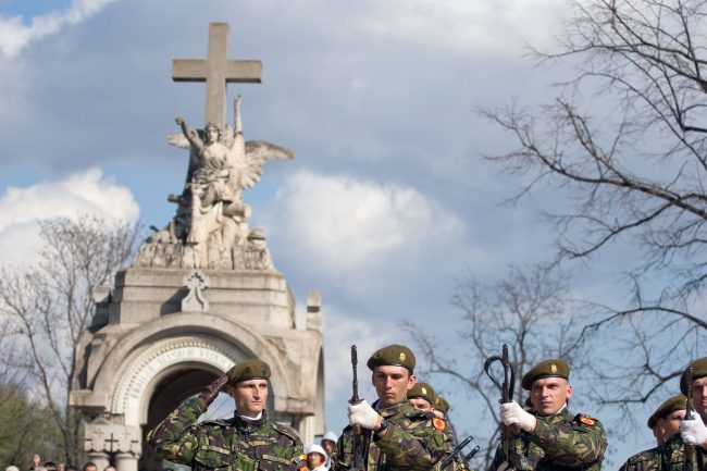 Soldiers are firing their guns before ceremony for defunct soldier that lost its life on Afganistan front in Galați, Romania on March 25th, 2008.